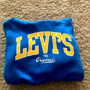 Levi’s small blue hoodie, originally $80. Never worn and in perfect condition.